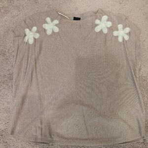 Beige Sweater with White Floral Accents